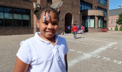 Angel smiling on the playground