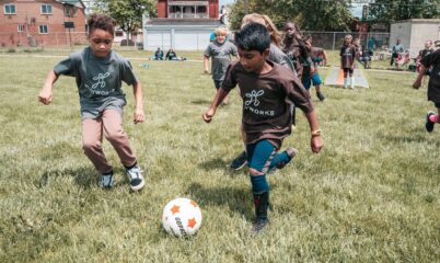 students playing soccer