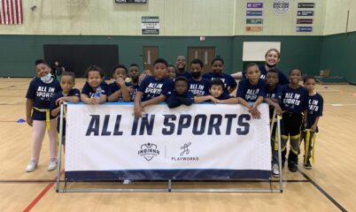 Group of children holding banner